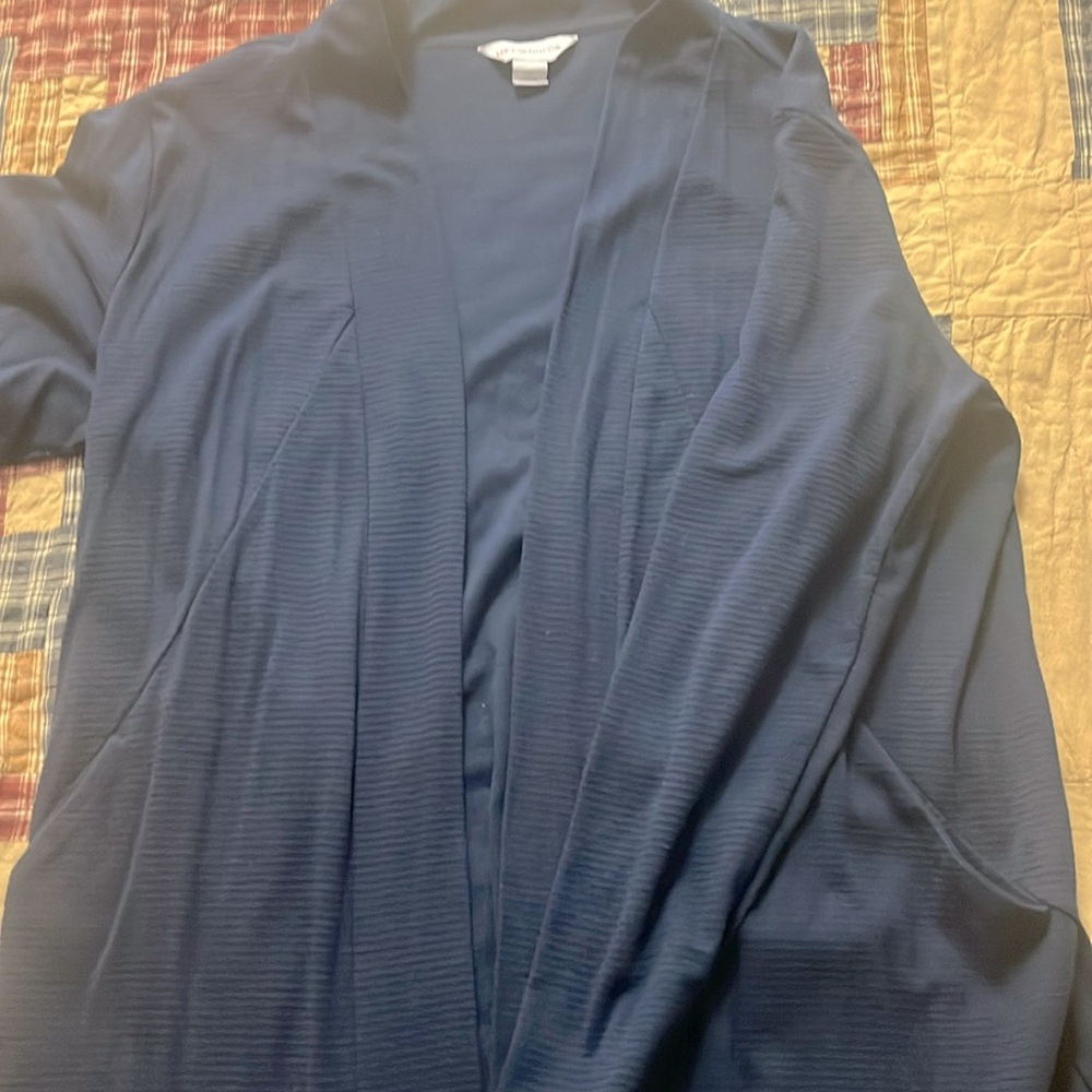 Navy blue cardigan with functional pockets.